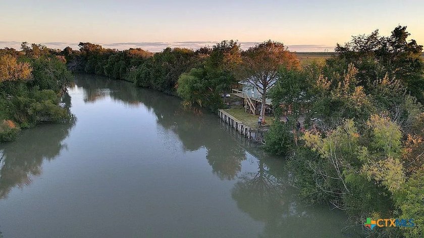 Amazing custom built home sits directly on the banks of the - Beach Home for sale in Tivoli, Texas on Beachhouse.com