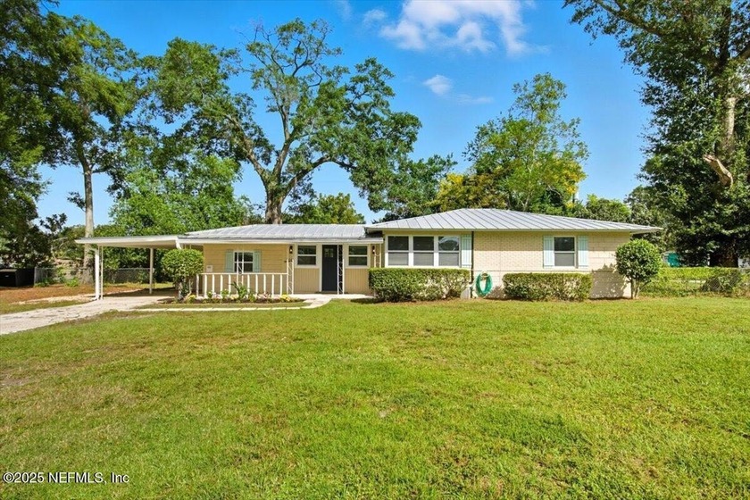 Nestled on a spacious corner lot of over 1/3 acre this - Beach Home for sale in Jacksonville, Florida on Beachhouse.com