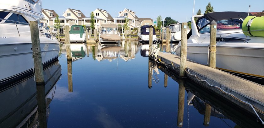 Secure a premier 40-foot dockominium at Village Cove Marina - Beach Lot for sale in Spring Lake, Michigan on Beachhouse.com