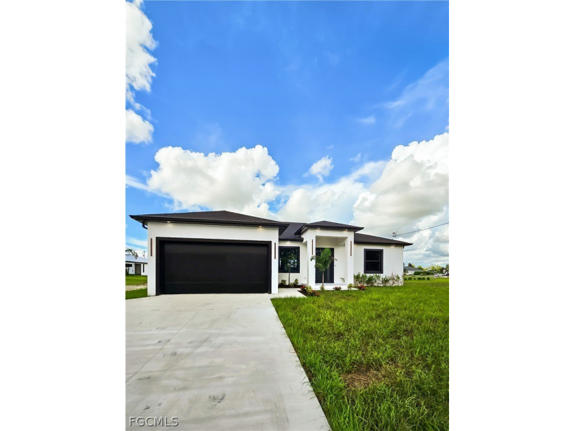 Stunning brand-new 4-bedroom + den, 3-bath ranch-style home - Beach Home for sale in Cape Coral, Florida on Beachhouse.com
