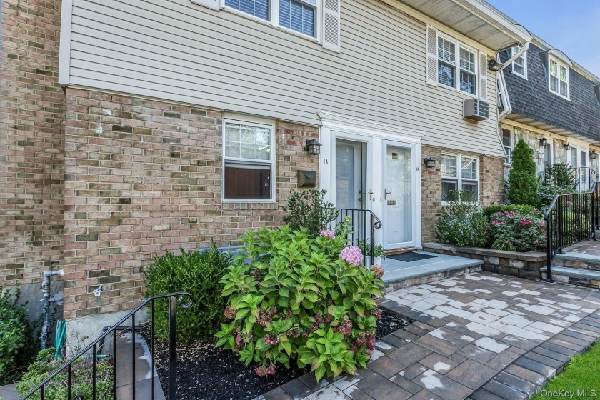 Welcome to this pristine 2 bedroom ground level end unit with - Beach Home for sale in Oyster Bay, New York on Beachhouse.com
