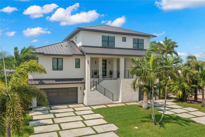 This extraordinary three-story custom masterpiece boasts 75 feet - Beach Home for sale in St. Petersburg, Florida on Beachhouse.com