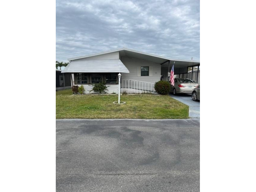 Welcoming water views!! This manufactured home features two - Beach Home for sale in Melbourne, Florida on Beachhouse.com