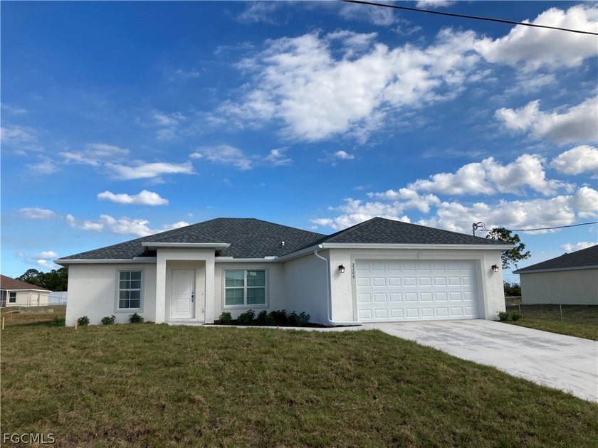 ** Brand new 3/2 + DEN, 2 CAR Garage. A beautiful open layout - Beach Home for sale in Lehigh Acres, Florida on Beachhouse.com