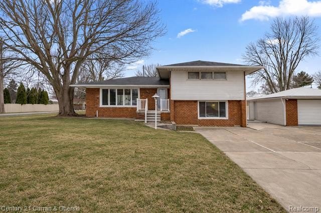 Completely updated quad-level home situated on a spacious double - Beach Home for sale in Gibraltar, Michigan on Beachhouse.com