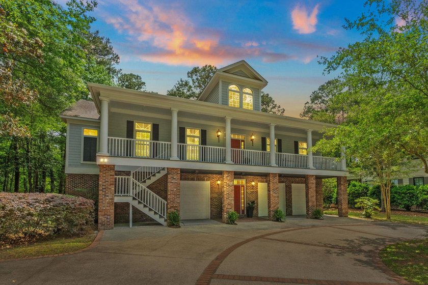 Elegantly positioned along the 8th fairway of the private Tom - Beach Home for sale in Murrells Inlet, South Carolina on Beachhouse.com