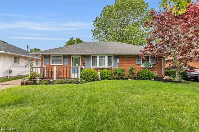 Step into this charming brick ranch, a picture-perfect home - Beach Home for sale in Sheffield Lake, Ohio on Beachhouse.com