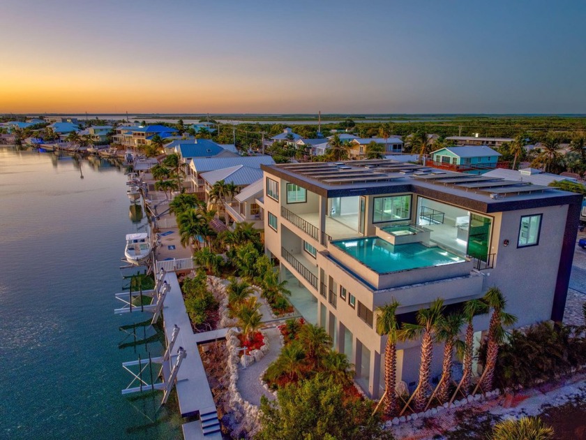 Experience unparalleled luxury in this Brand New Custom Built 6 - Beach Home for sale in Summerland Key, Florida on Beachhouse.com