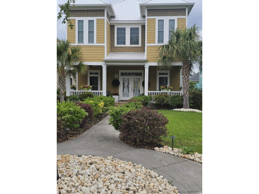 This beautiful, dream home welcomes you down a well-manicured - Beach Home for sale in Myrtle Beach, South Carolina on Beachhouse.com