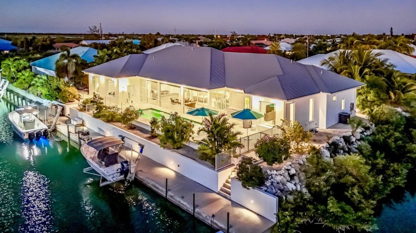 Exquisite Waterfront Estate in the exclusive Cudjoe - Beach Home for sale in Cudjoe Key, Florida on Beachhouse.com