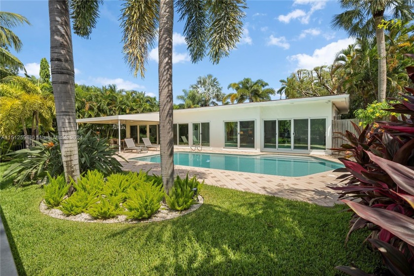 Midcentury Modern meets classic Florida in this beautiful 3/3 - Beach Home for sale in Wilton Manors, Florida on Beachhouse.com
