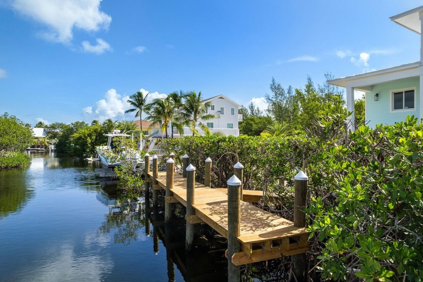 Experience modern coastal design and opulent island living in - Beach Home for sale in Key Largo, Florida on Beachhouse.com