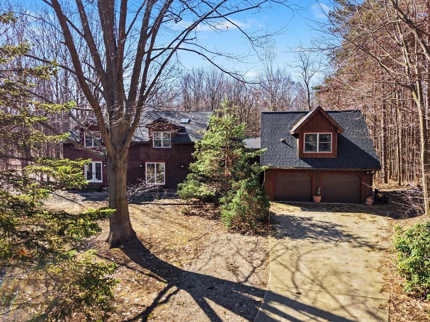Welcome to Laketown Living. Tucked away on 6.12 wooded acres in - Beach Home for sale in Holland, Michigan on Beachhouse.com