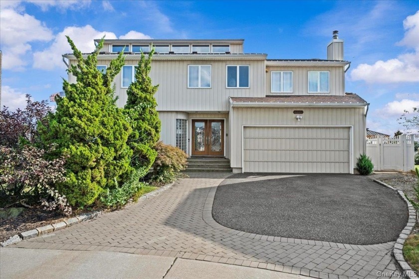 Waterfront property for Sale:  Features stunning views, includes - Beach Home for sale in Seaford, New York on Beachhouse.com