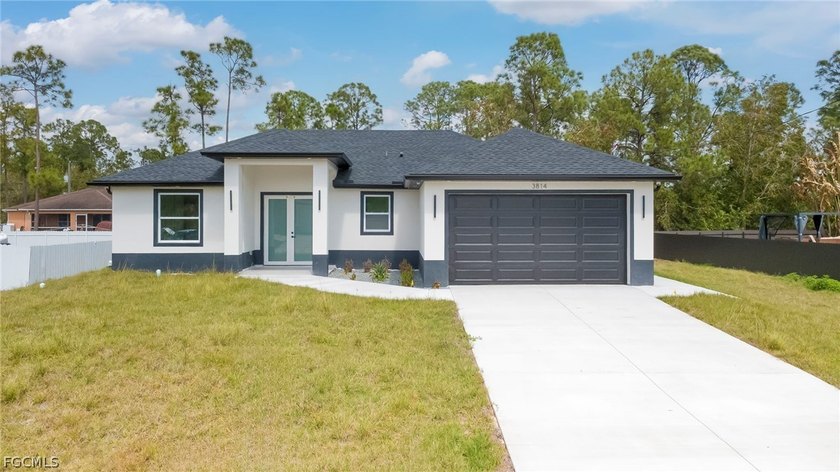 NEW CONSTRUCTION | MODERN DESIGN | MOVE-IN READY Welcome to this - Beach Home for sale in Lehigh Acres, Florida on Beachhouse.com