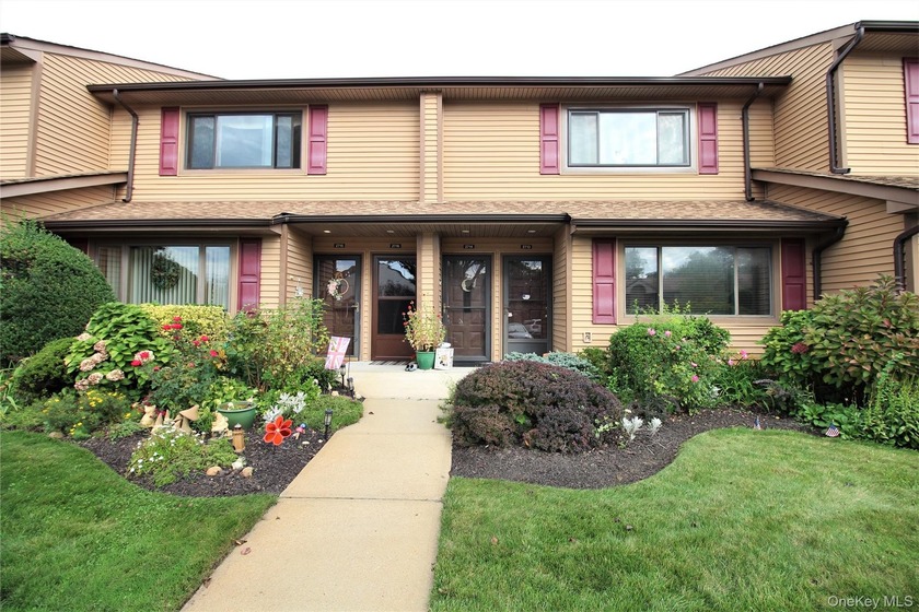 Welcome to resort-style living in the Oceanside Cove gated - Beach Home for sale in Oceanside, New York on Beachhouse.com