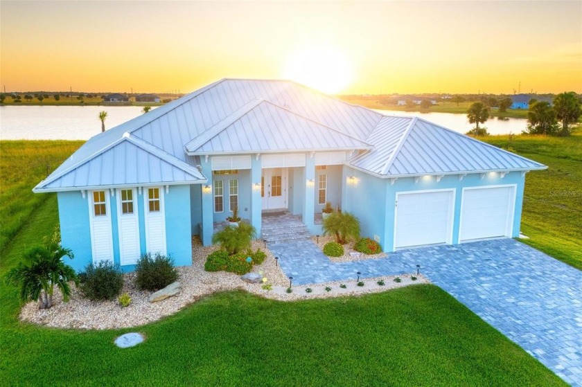 Only two years young, this virtually new custom lakefront pool - Beach Home for sale in Placida, Florida on Beachhouse.com