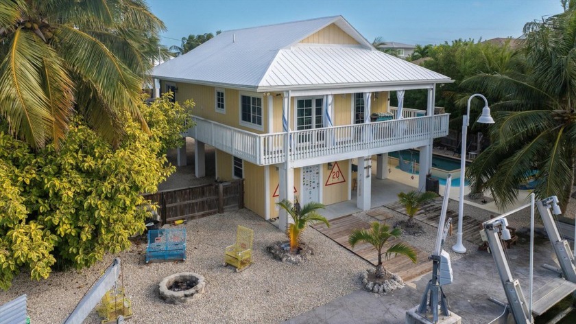 Welcome to your stunning 3-bedroom, 2-bathroom oasis, nestled at - Beach Home for sale in Cudjoe Key, Florida on Beachhouse.com