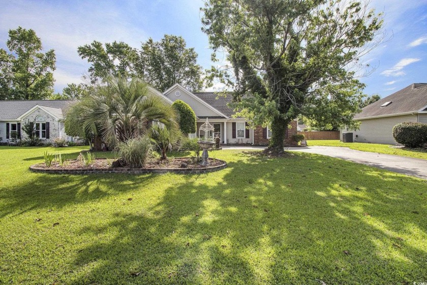 Discover this centrally located gem nestled on a generous lot in - Beach Home for sale in Myrtle Beach, South Carolina on Beachhouse.com