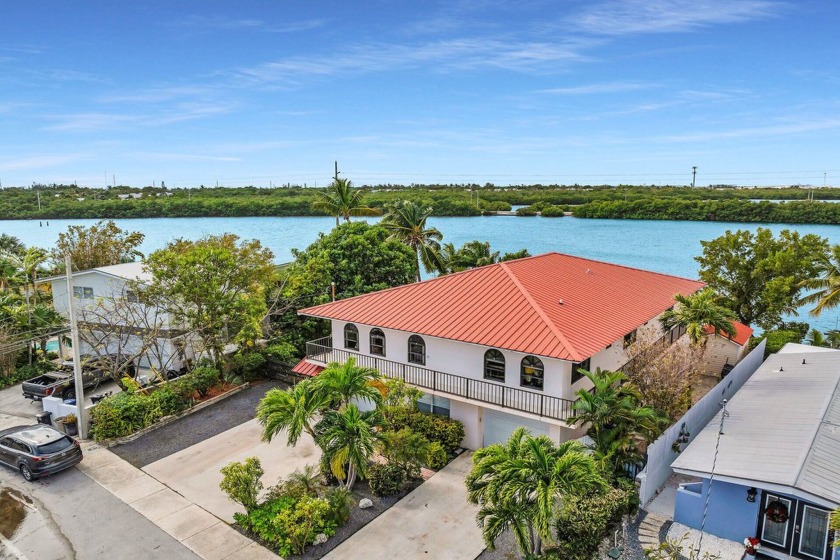 Open Water, Elevated, Concrete Home in best Waterfront community - Beach Home for sale in Key Haven, Florida on Beachhouse.com