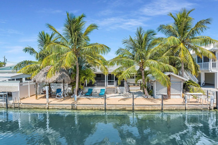 Discover ''Conch Cottage,'' a charmingly updated 3-bedroom - Beach Home for sale in Little Torch Key, Florida on Beachhouse.com