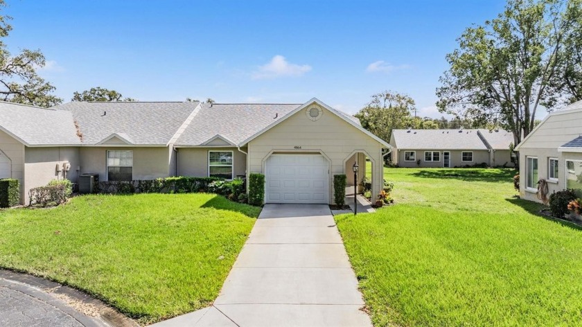 Welcome home to Wedgwood Village at Heritage Lake - an active - Beach Condo for sale in New Port Richey, Florida on Beachhouse.com