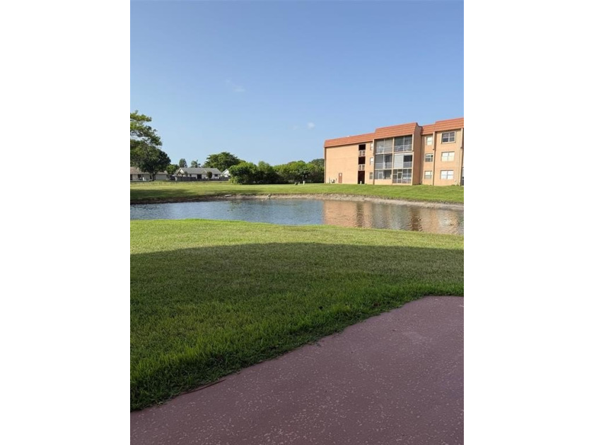 Charming Corner Garden-Style Condo Located on the first floor in - Beach Condo for sale in Sunrise, Florida on Beachhouse.com