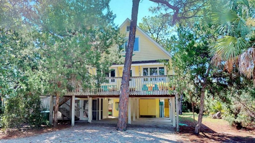 Charming beach cottage, open living/kitchen/dining on first - Beach Home for sale in St. George Island, Florida on Beachhouse.com