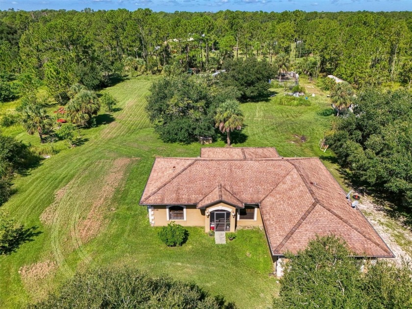 Custom-Built 3.2-Acre Estate with Pond, Tiny Home & Gorgeous - Beach Home for sale in North Port, Florida on Beachhouse.com