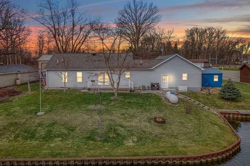 SUNSETS, SHORELINES & STRESS FREE LIVING on BIRD LAKE - Beach Home for sale in Osseo, Michigan on Beachhouse.com