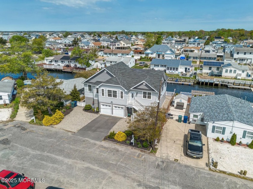 Discover the breathtaking beauty of this custom-built waterfront - Beach Home for sale in Little Egg Harbor, New Jersey on Beachhouse.com