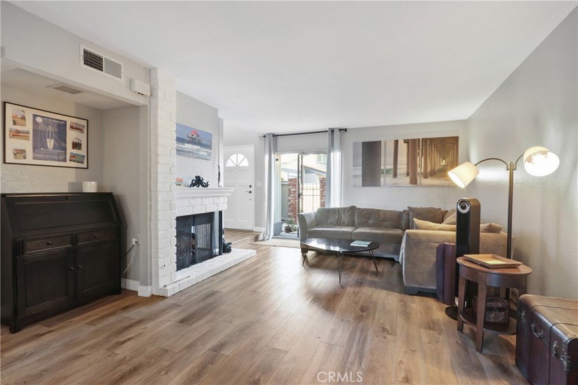 Nestled in the heart of a vibrant beach community, this - Beach Townhome/Townhouse for sale in Huntington Beach, California on Beachhouse.com