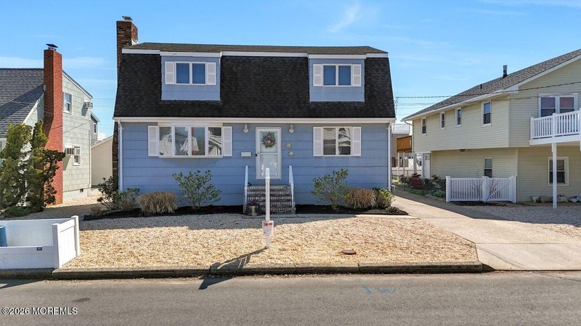 Coastal living in sought-after Surf City! Expanded Cape ideally - Beach Home for sale in Surf City, New Jersey on Beachhouse.com