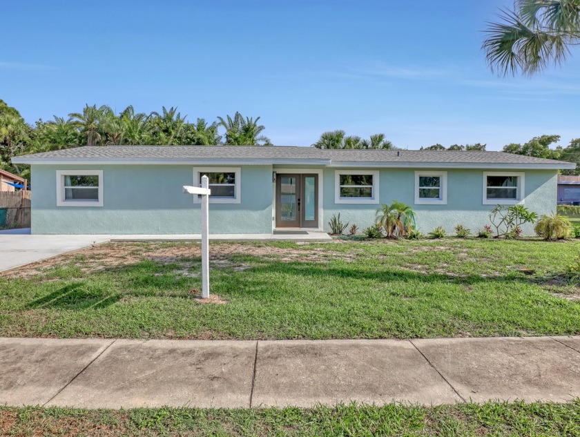 Completely remodeled in 2022, this stunning 4-bedroom - Beach Home for sale in Merritt Island, Florida on Beachhouse.com