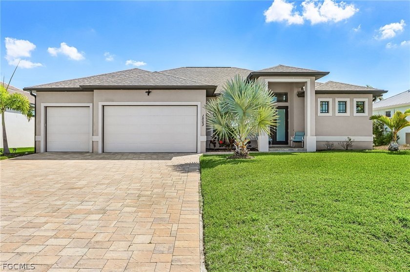 This BEAUTIFUL custom built 2019 Gulf Access POOL home located - Beach Home for sale in Cape Coral, Florida on Beachhouse.com