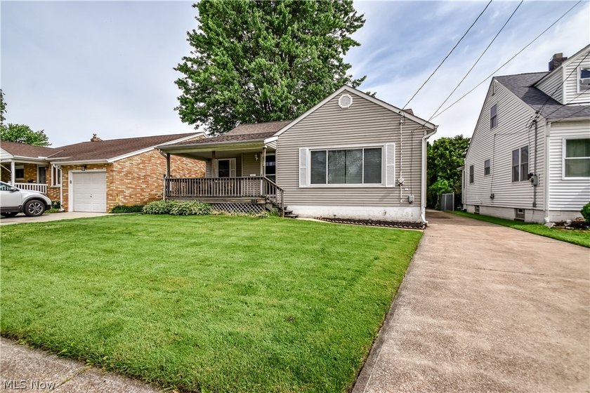 Step onto the composite covered front porch and walk into this - Beach Home for sale in Fairport Harbor, Ohio on Beachhouse.com