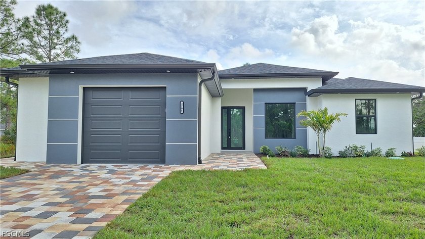 Beautiful NEW CONSTRUCTION located in a quiet and growing area - Beach Home for sale in Lehigh Acres, Florida on Beachhouse.com
