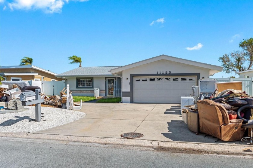 Discover this stunning waterfront property on the coveted Isle - Beach Home for sale in Treasure Island, Florida on Beachhouse.com