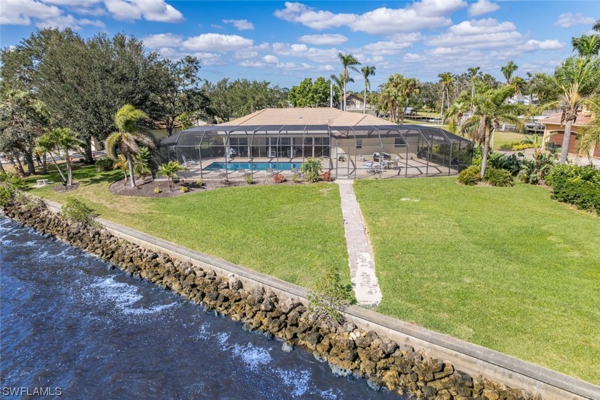 Welcome to your RIVERFRONT DREAM located on the Caloosahatchee - Beach Home for sale in North Fort Myers, Florida on Beachhouse.com