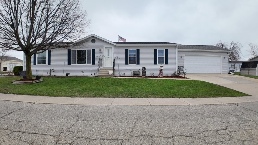 Discover this fully renovated, one-of-a-kind double-wide home in - Beach Home for sale in Holland, Michigan on Beachhouse.com