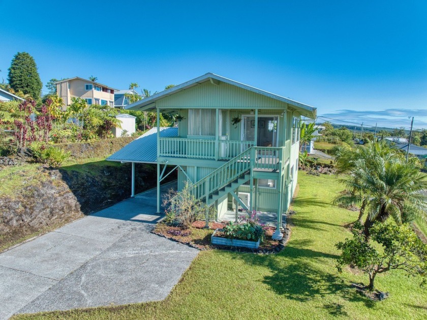 Welcome to your dream home in the serene and picturesque Kaumana - Beach Home for sale in Hilo, Hawaii on Beachhouse.com