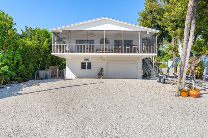 Wonderful ***CONCRETE HOME*** with *** IMPACT WINDOWS AND - Beach Home for sale in Key Largo, Florida on Beachhouse.com