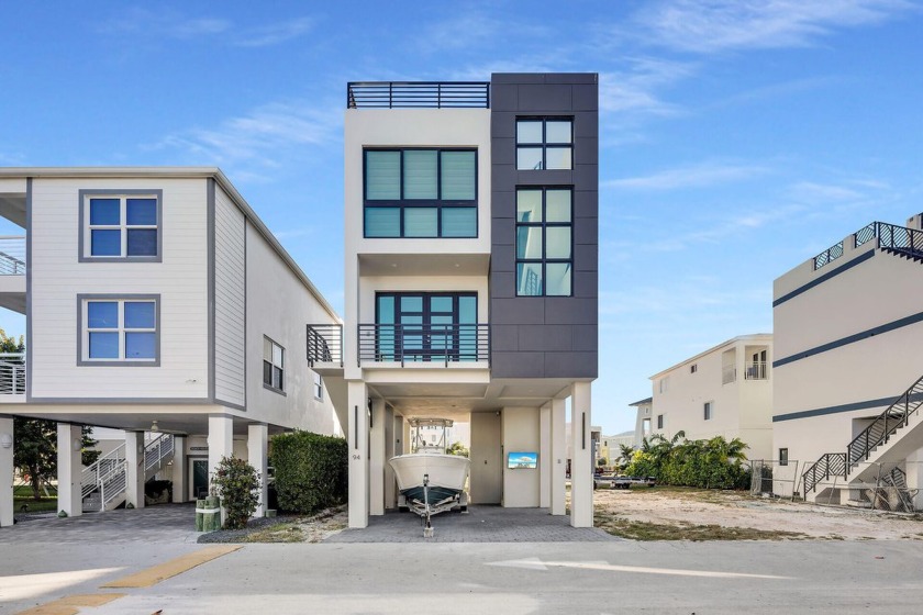 This newly built CBS home in desirable Key Largo Ocean Resort - Beach Home for sale in Key Largo, Florida on Beachhouse.com