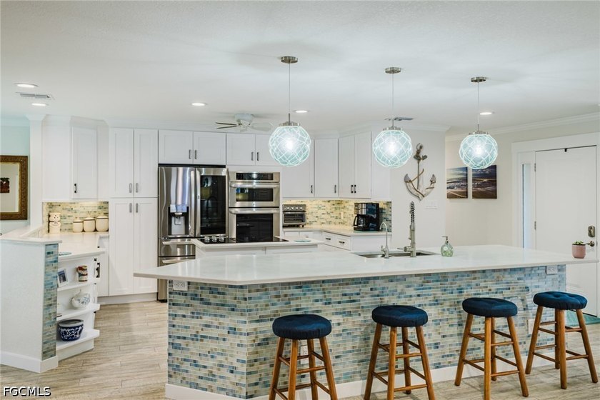 This beautifully updated home offers direct Gulf access with a - Beach Home for sale in Fort Myers, Florida on Beachhouse.com