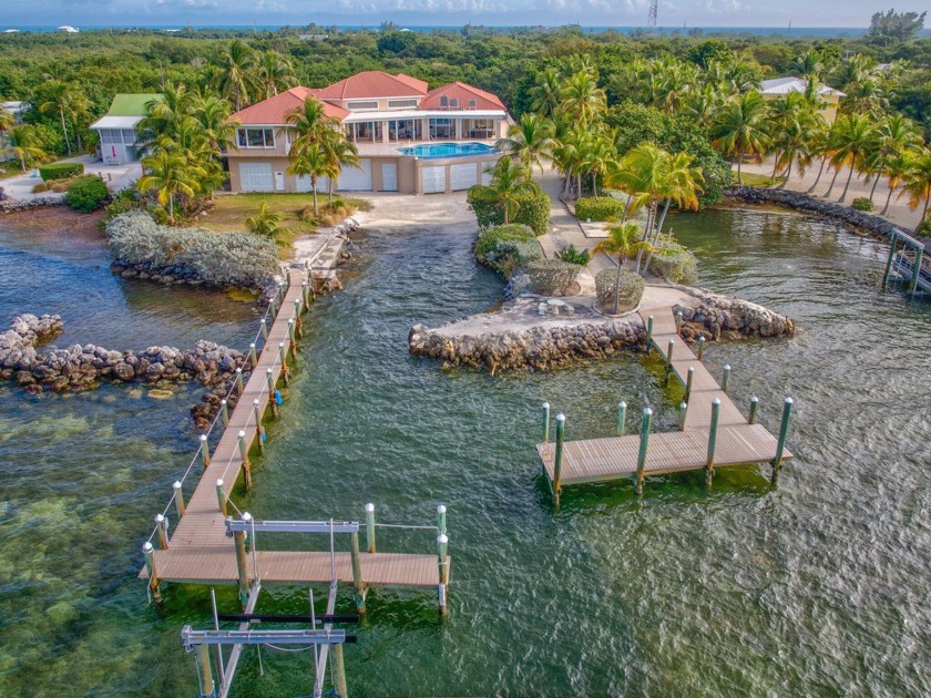 Nestled on a secluded 2-acre lot in Grassy Key, Marathon, this - Beach Home for sale in Marathon, Florida on Beachhouse.com