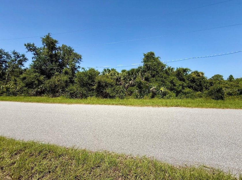 Build your dream home on this spacious 1/2-acre lot, nestled in - Beach Lot for sale in Port Charlotte, Florida on Beachhouse.com