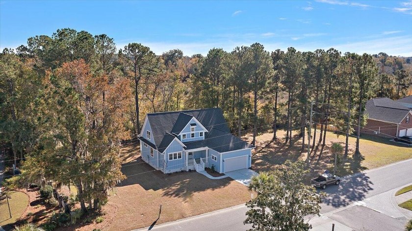 New construction home on generous homesite with privacy, in the - Beach Home for sale in Hanahan, South Carolina on Beachhouse.com