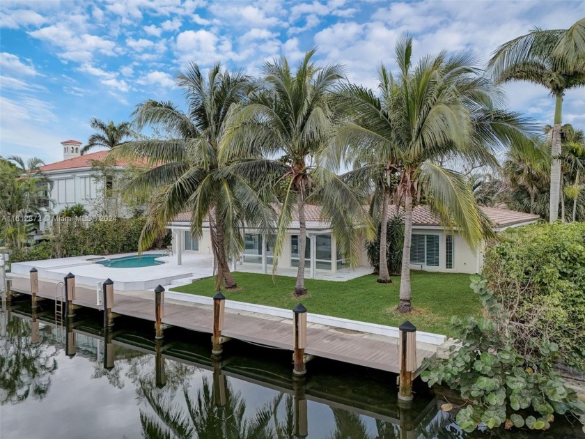 Discover South Florida charm in this 4-bedroom, 4.5-bathroom - Beach Home for sale in Lighthouse Point, Florida on Beachhouse.com