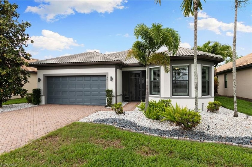 One of the few homes in Del Webb Naples offering both lake and - Beach Home for sale in Ave Maria, Florida on Beachhouse.com