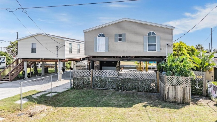 Welcome to your waterfront oasis! This charming home offers a - Beach Home for sale in Hudson, Florida on Beachhouse.com